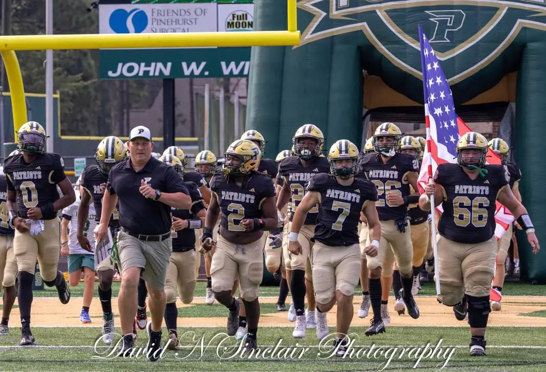 In a rare Saturday game, Pinecrest conditioning was a factor in the Patriots' 33-22 win in Southern Pines. 